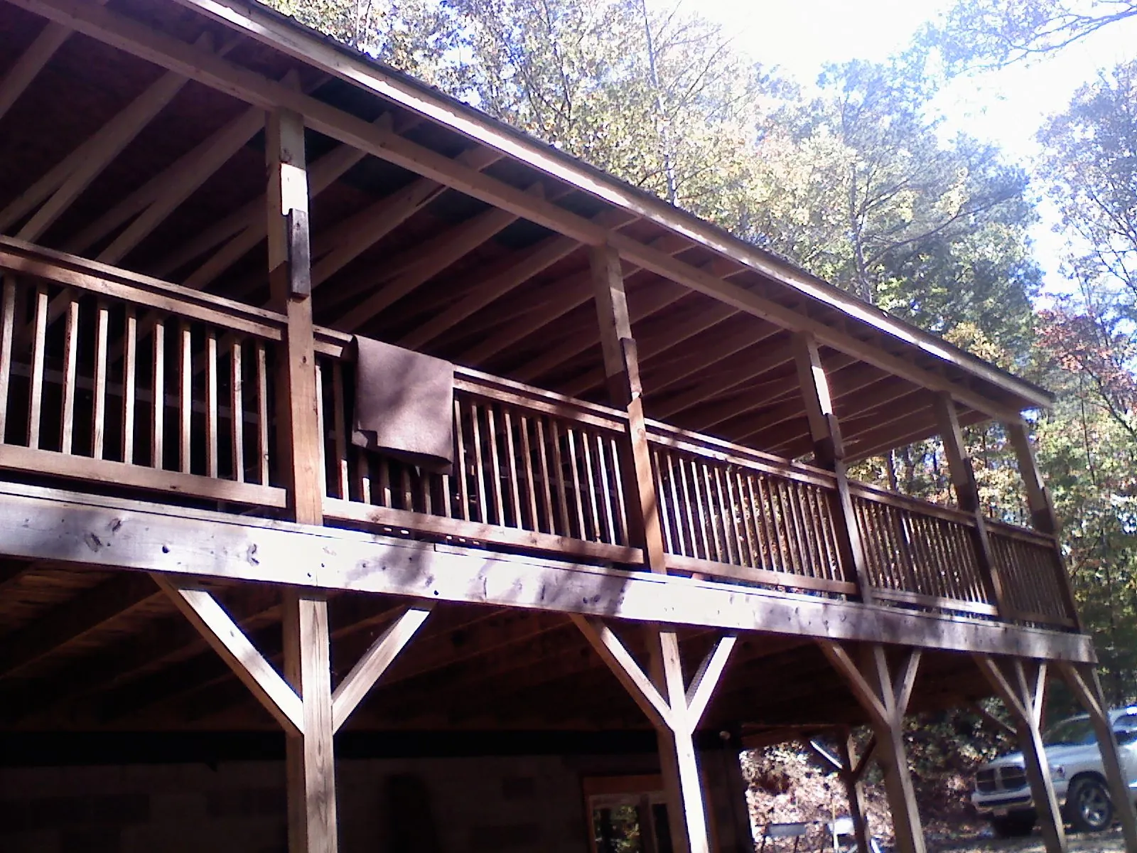 Timber framing under a new elevated porch and deck — Roof Leak Repair in Confluence by Roofing Brothers